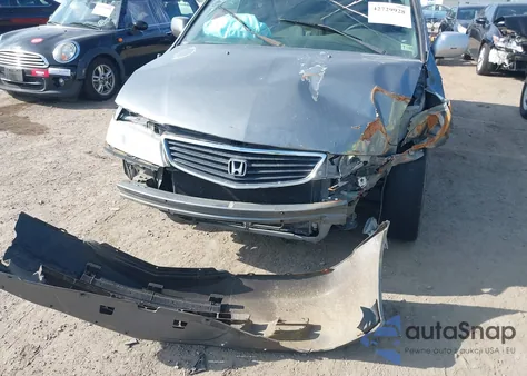 2001 Honda Odyssey Ex z USA, uszkodzony, nr VIN 2HKRL18601H558416